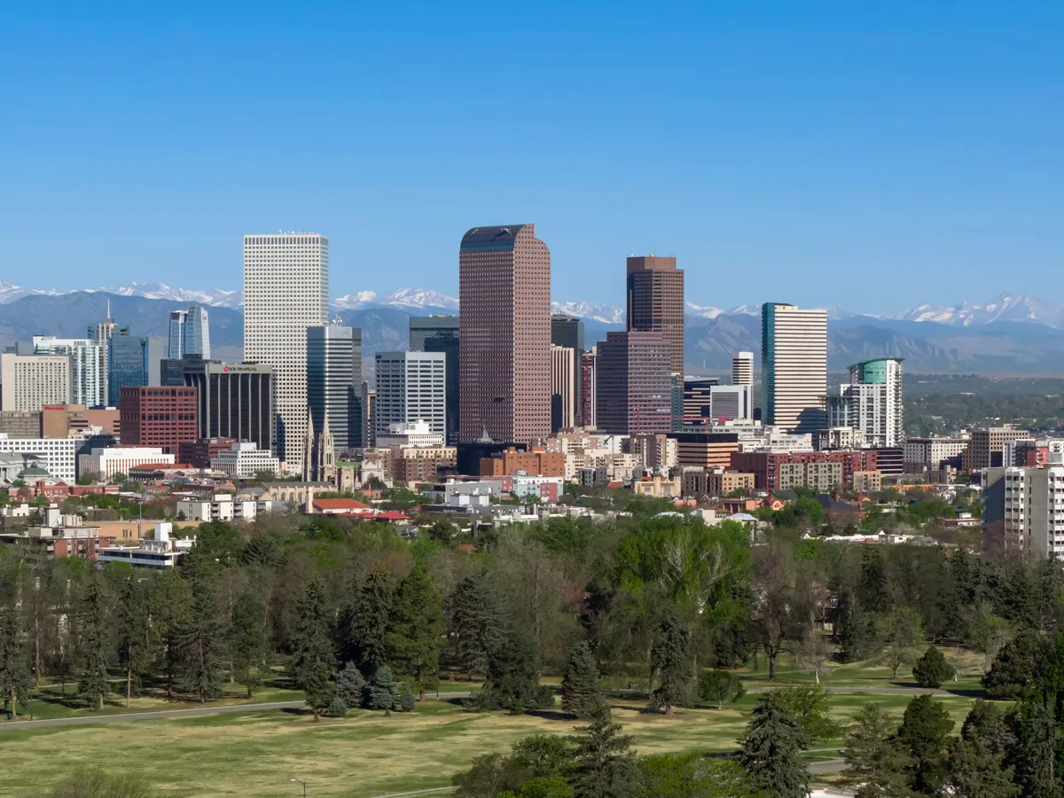 Denver: the downtown skyline with the Rocky Mountains behind